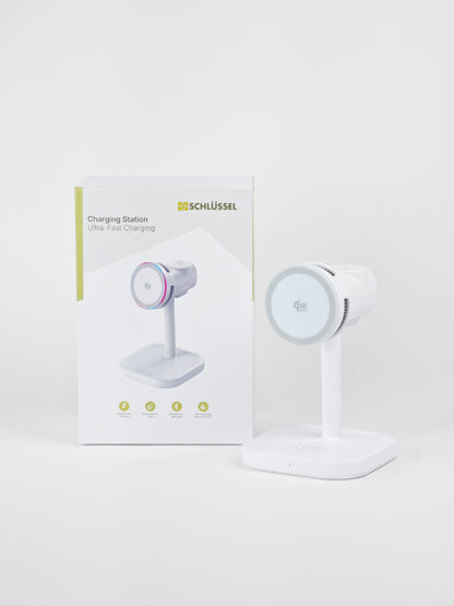 Schlüssel 3-in-1 wireless charging station in white, displayed next to its product retail packaging box against a clean light gray background