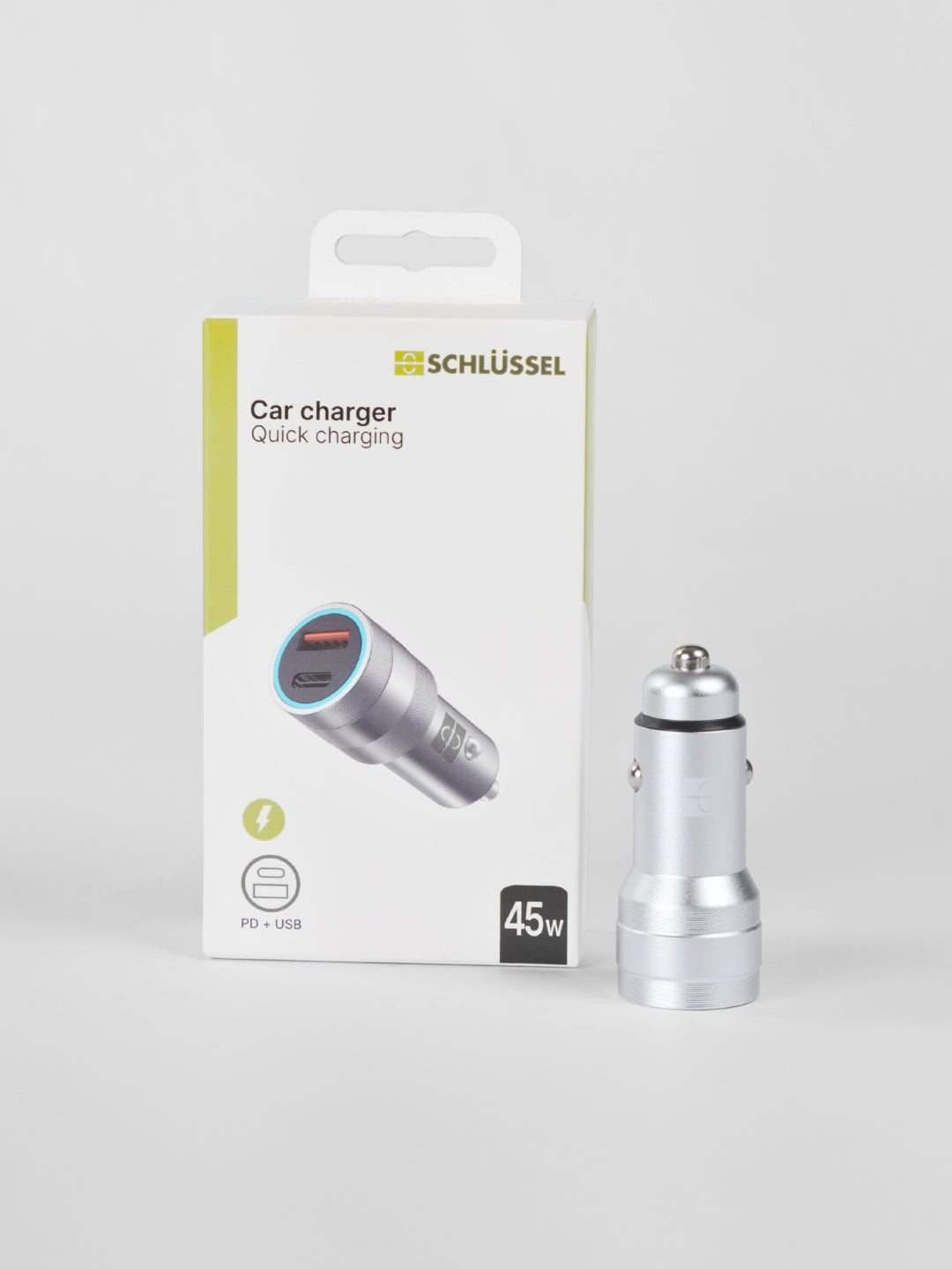 Schlüssel 45W metallic dual-port car charger displayed standing vertically next to its retail packaging box against a clean light gray background
